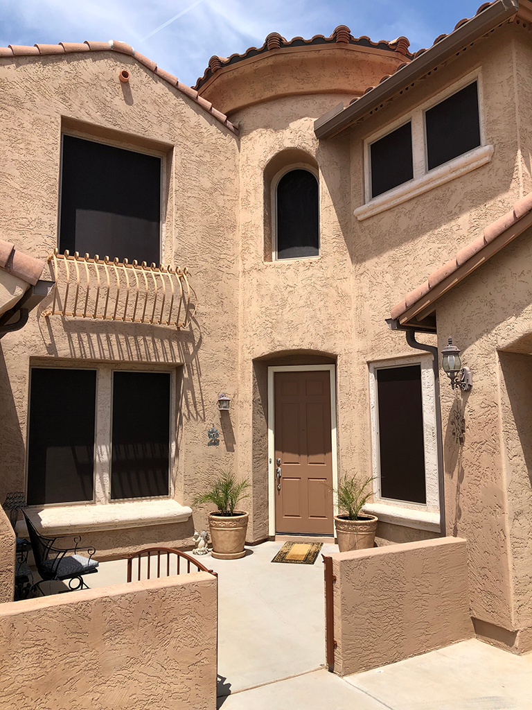 Black sun screens on an Arizona home